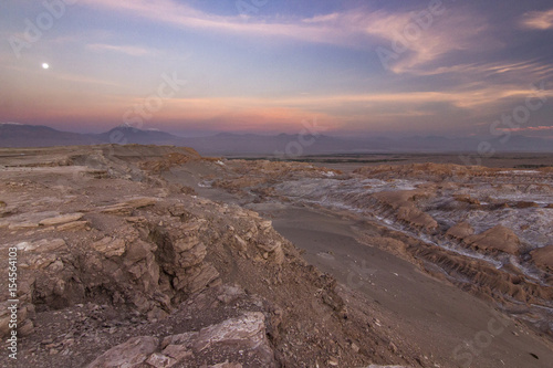 salty Moon valley in atacama desert in Chile at sunset