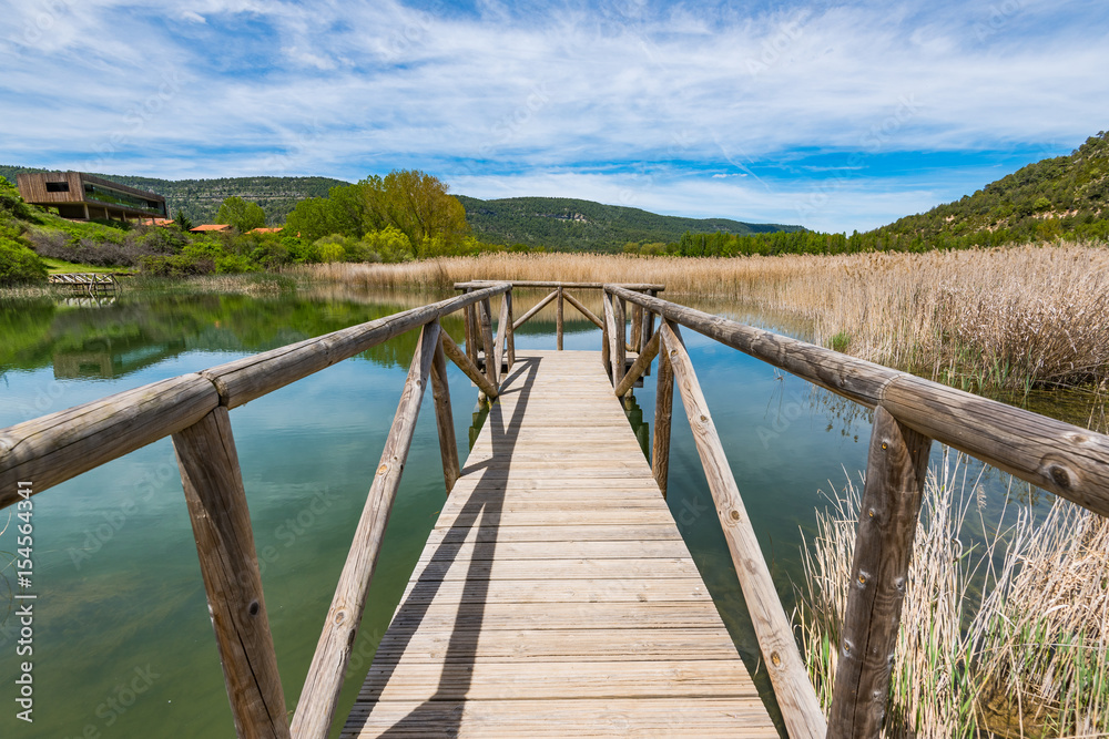 Timber footpath over lake Una,Spain