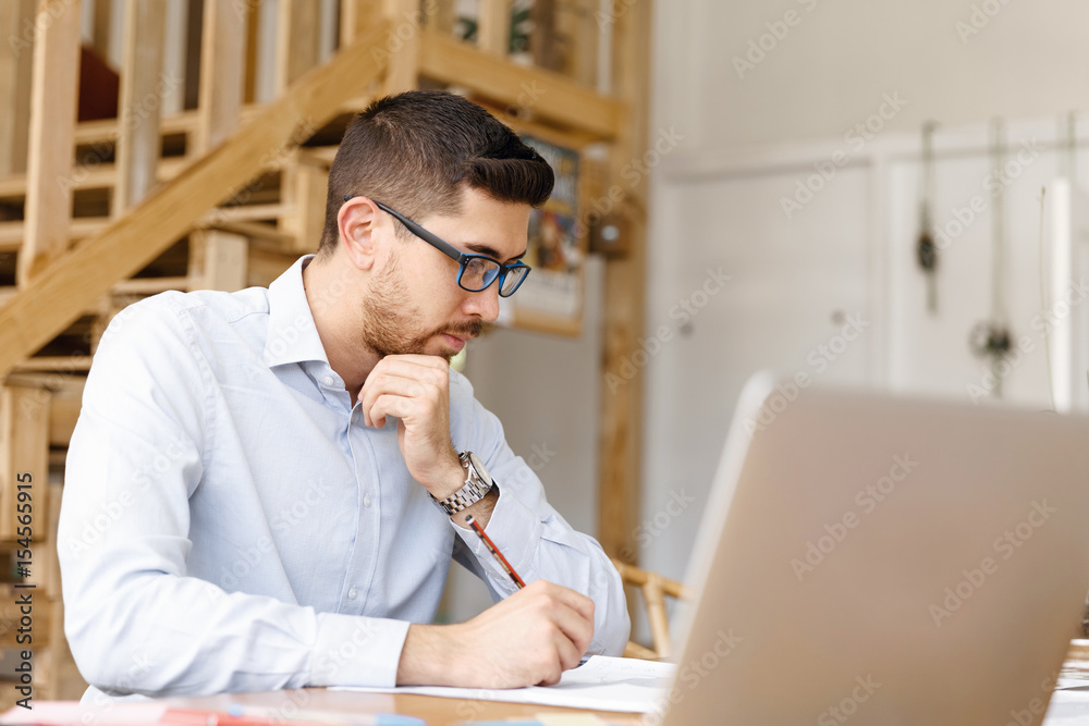 Young man architect in office Young man architect in office