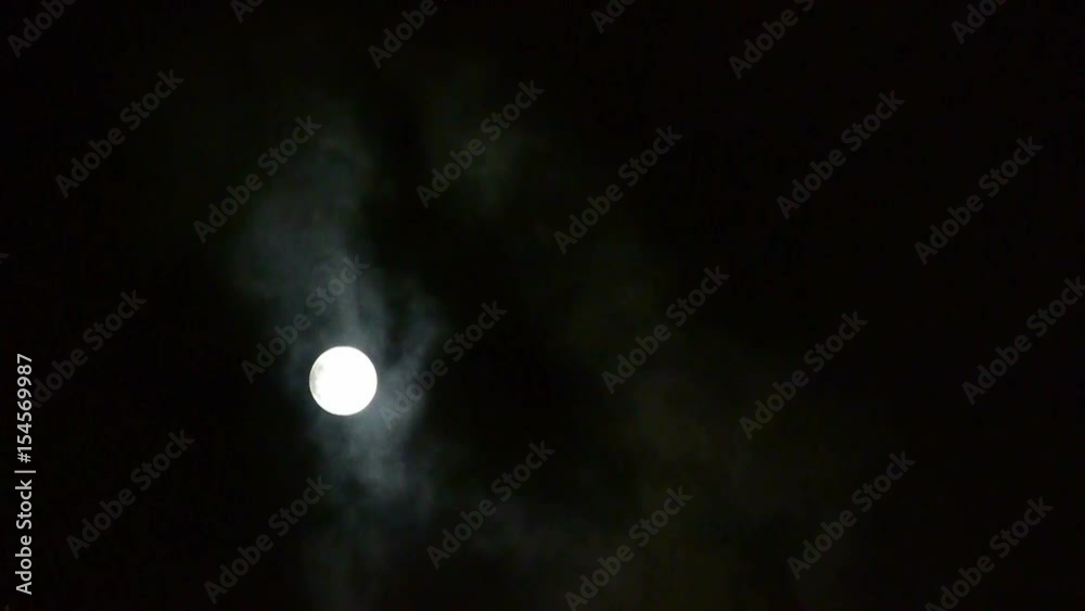 full moon through cloudy,night flight over clouds and smoke,mystery fairyland scene.