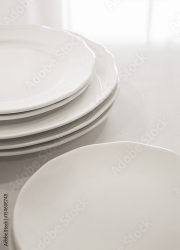 Pile of white plate.