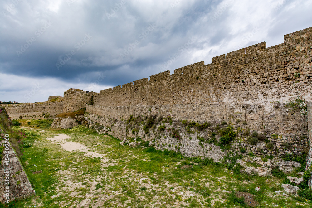 Astonishing walls of Rhodes old town on a stormy day, Rhodes island, Greece