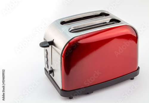 Bright red shiny retro toaster isolated on white
