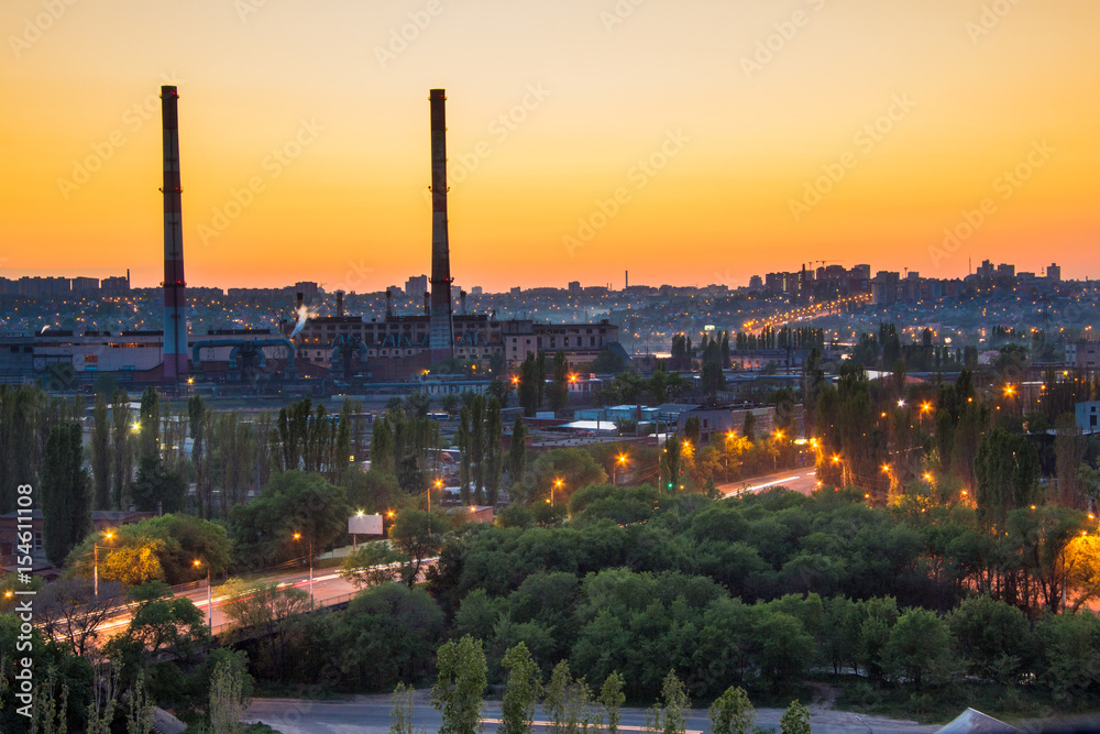 Evening Voronezh cityscape. Summer sunset at industrial area