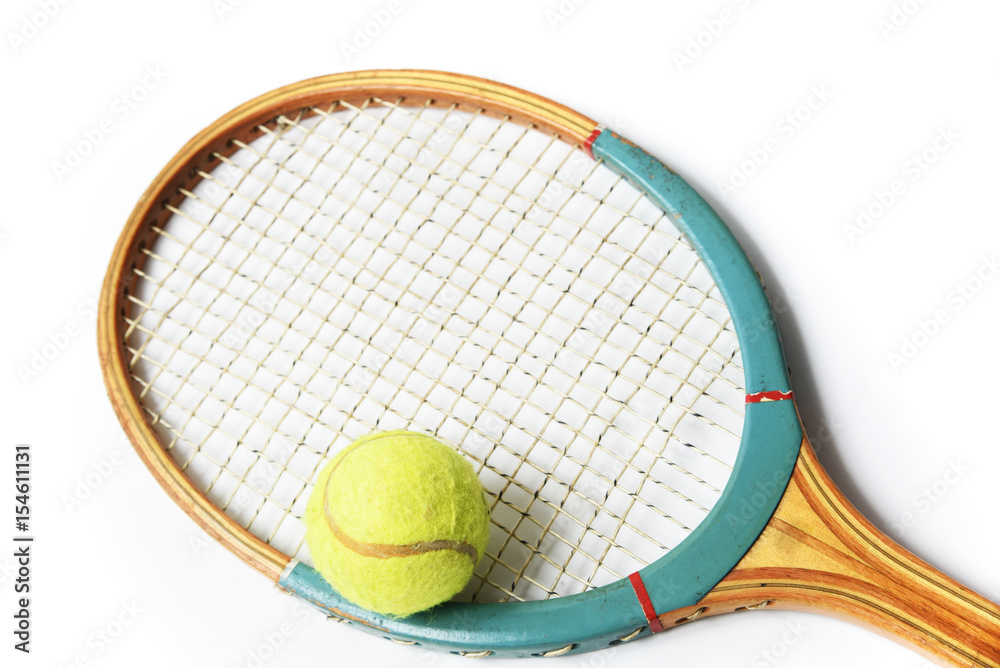 Old tennis racket and ball