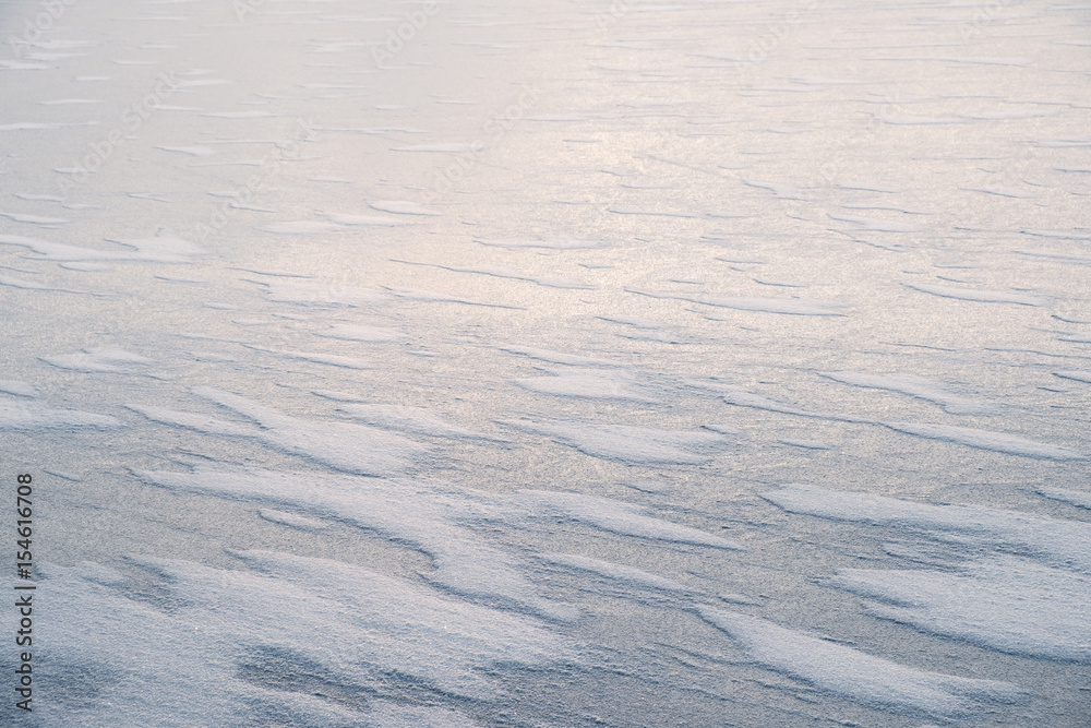 Surface of ice field with sunlight in winter day Surface of ice field with sunlight in winter day