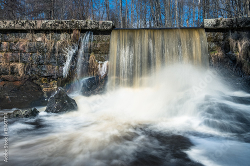 Closeup view of little waterfall on the river