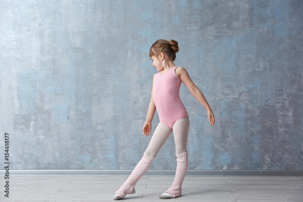 Cute little ballerina in dance studio Cute little ballerina in dance studio