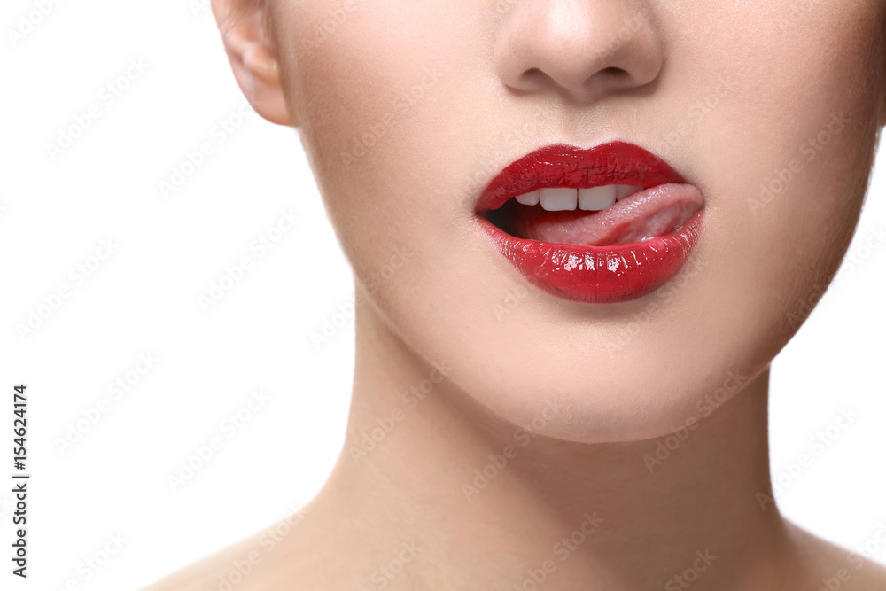 Fototapeta premium Woman with red lips isolated on white
