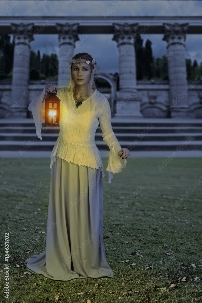 female high elf with lantern at night female high elf with lantern at night