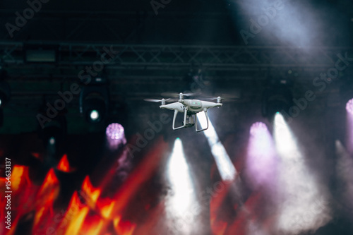 Small drone shooting scene at outdoors concert