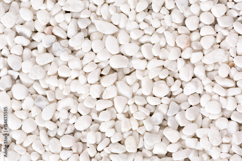 White dry pebbles background.