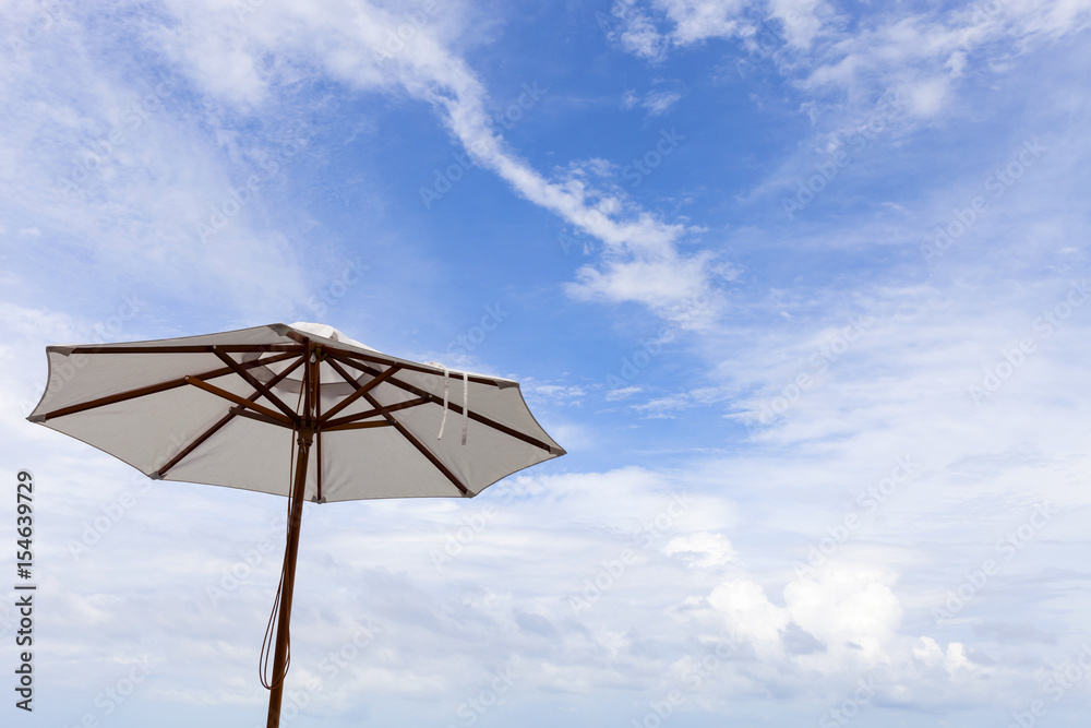 umbrella beach on sky background.