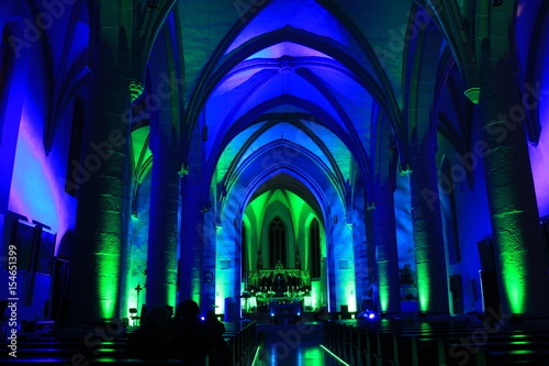 Church with romantic lighting in several colors.