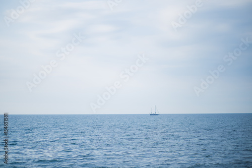 yacht and blue water ocean