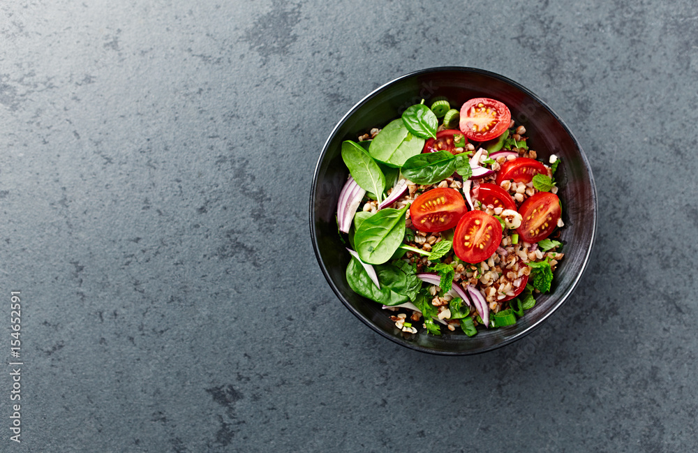 Buckwheat salad with cherry tomatoes and baby spinach Buckwheat salad with cherry tomatoes and baby spinach