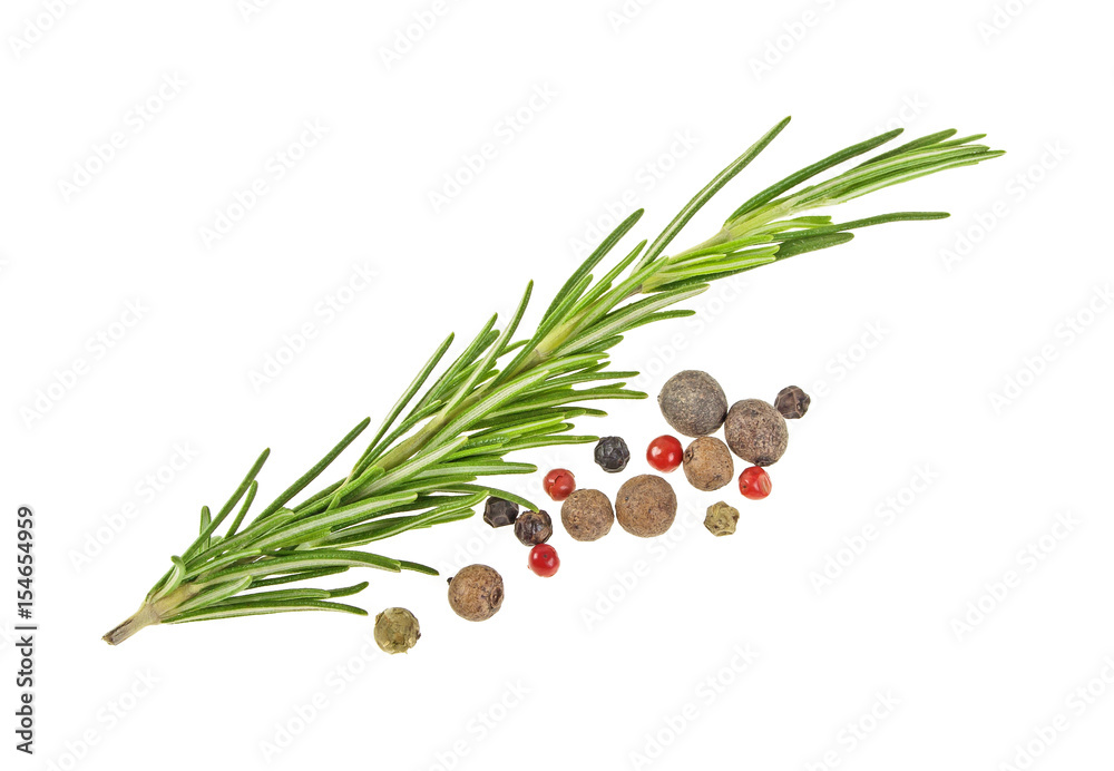 Fresh organic rosemary and pepper isolated on a white background