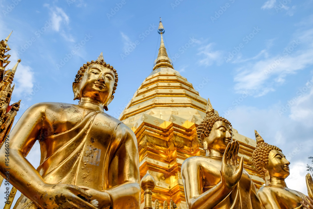 Golden Buddha statue in Wat Phra That Doi Suthep is tourist attraction of Chiang Mai, Thailand.Asia. Golden Buddha statue in Wat Phra That Doi Suthep is tourist attraction of Chiang Mai, Thailand.Asia.