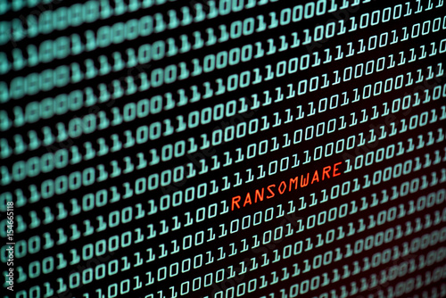 Ransomware or Wannacry text and binary code concept from the desktop screen. concept background, selective focus
 photo