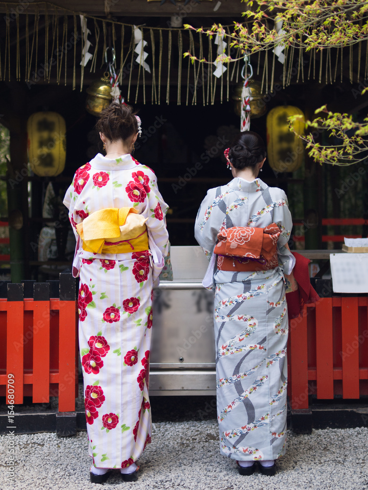 Praying Japanese Girl on Colorful Yukata