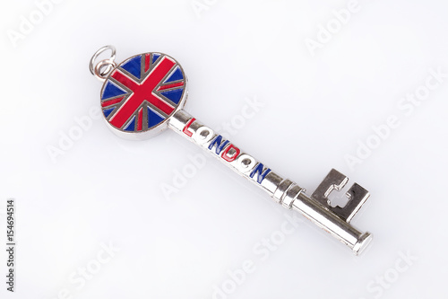 London key on a white surface. London key isolated on white background.