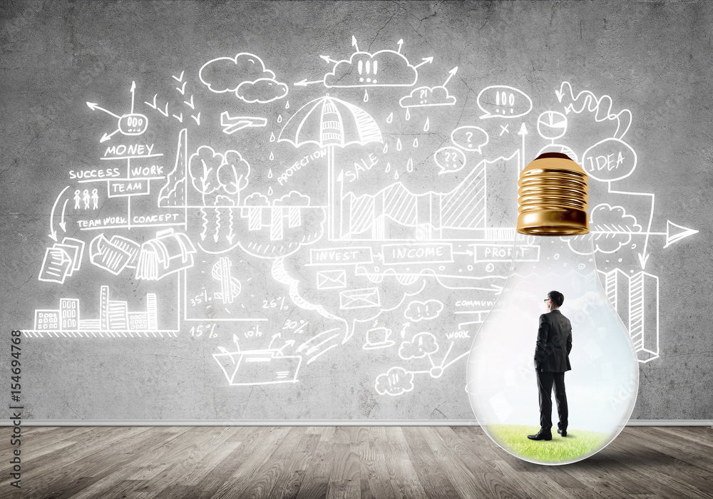 Businessman trapped in bulb Businessman trapped in bulb
