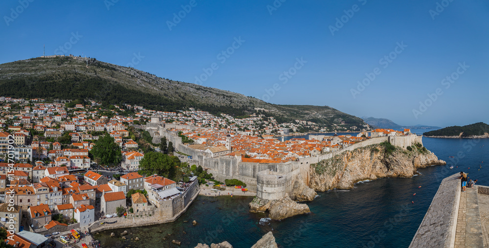 Tourists look out towards the old town of Dubrovnik