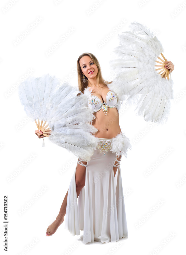 Beauty blonde in white belly dancer costume . Beauty blonde in white belly dancer costume .