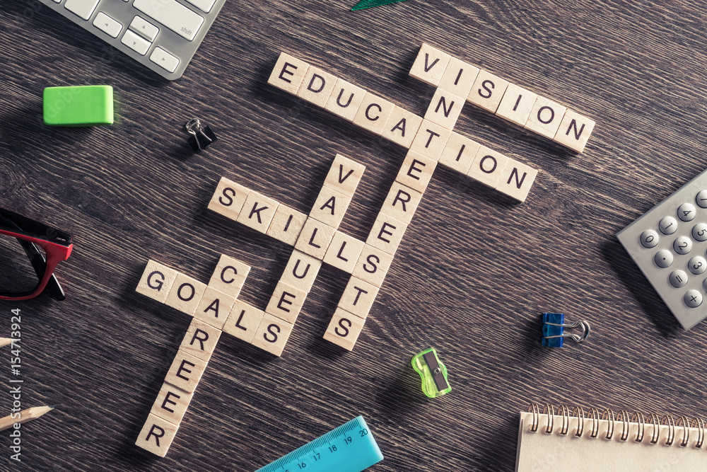 Conceptual business keywords on table with elements of game maki Conceptual business keywords on table with elements of game maki