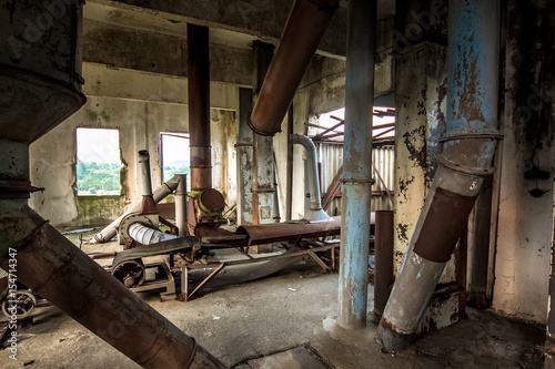 Old abandoned silo elevator with rusty equipment left in Eshera, Abkhazia