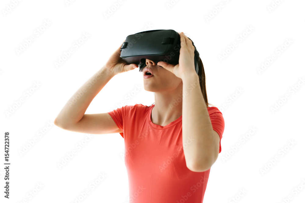Woman with glasses of virtual reality. Future technology concept. Modern imaging technology. On a white background. Woman with glasses of virtual reality. Future technology concept. Modern imaging technology. On a white background.