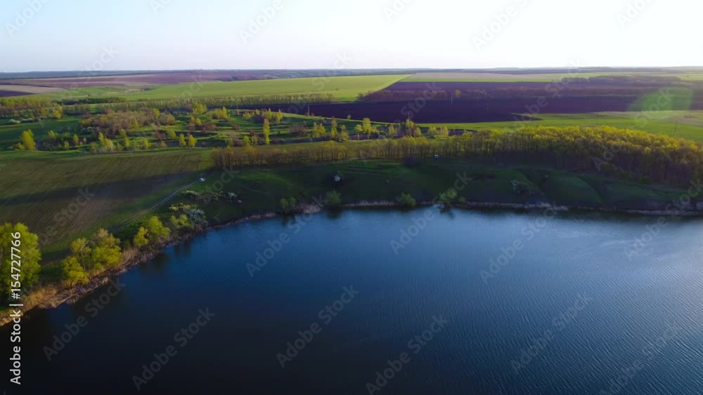 Flying over the beautiful spring river. Aerial camera shot. Ukraine. Flying over the beautiful spring river. Aerial camera shot. Ukraine.
