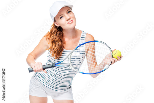Portrait of a cute tennis player on a white background with a racket © kosmos111
