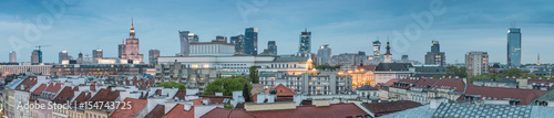 Warsaw, Poland, panorama of city center with modern skyscrapers and old city roofs