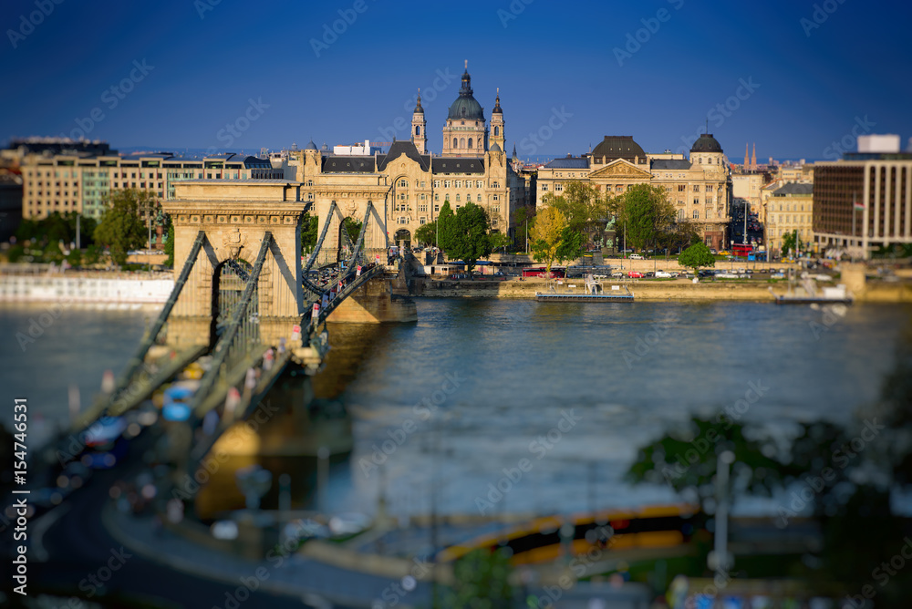 Fototapeta premium Danube embankment of Pest,with the Gresham Palace, today Four Seasons Hotel, Sofitel Hotel, and the St. Stephen Basilica. Budapest, Hungary, Europe
