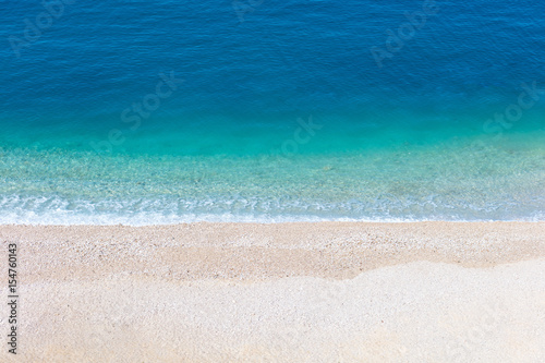 Top aerial view of empty beauty beach in Italy, Europe