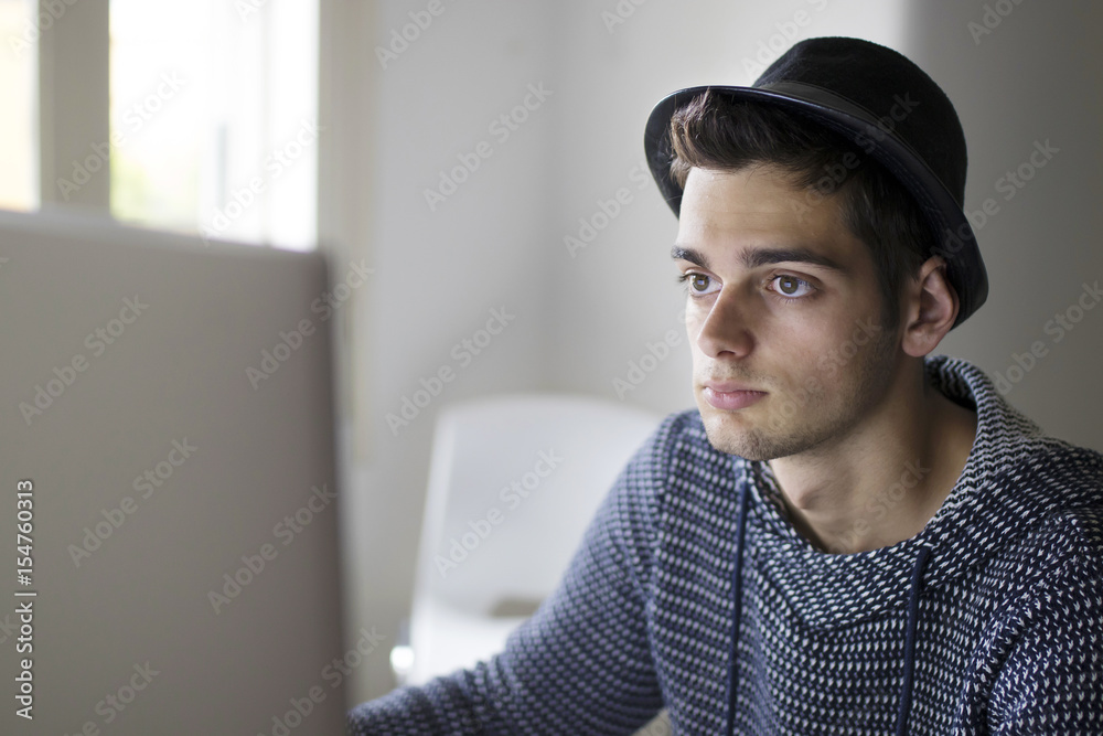 adult young working with your computer at home or in the office adult young working with your computer at home or in the office