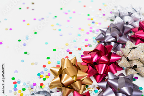 Macro festive bows with confetti