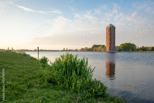 Obraz na płótnie Water tower over lake background, Aalsmeer, Nord Holland w salonie