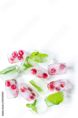 fresh cranberry in ice cubes on white background top view mock-up