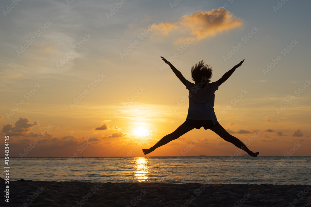 Freedom concept with silhouette young teenager happy and jump