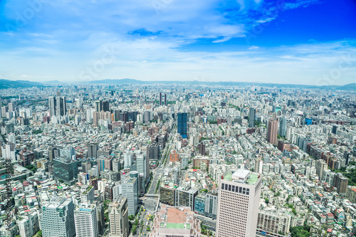 Asia Business concept for real estate and corporate construction - panoramic modern cityscape building bird eye aerial view under sunrise and morning blue bright sky  shot in Taipei 101  Taiwan
