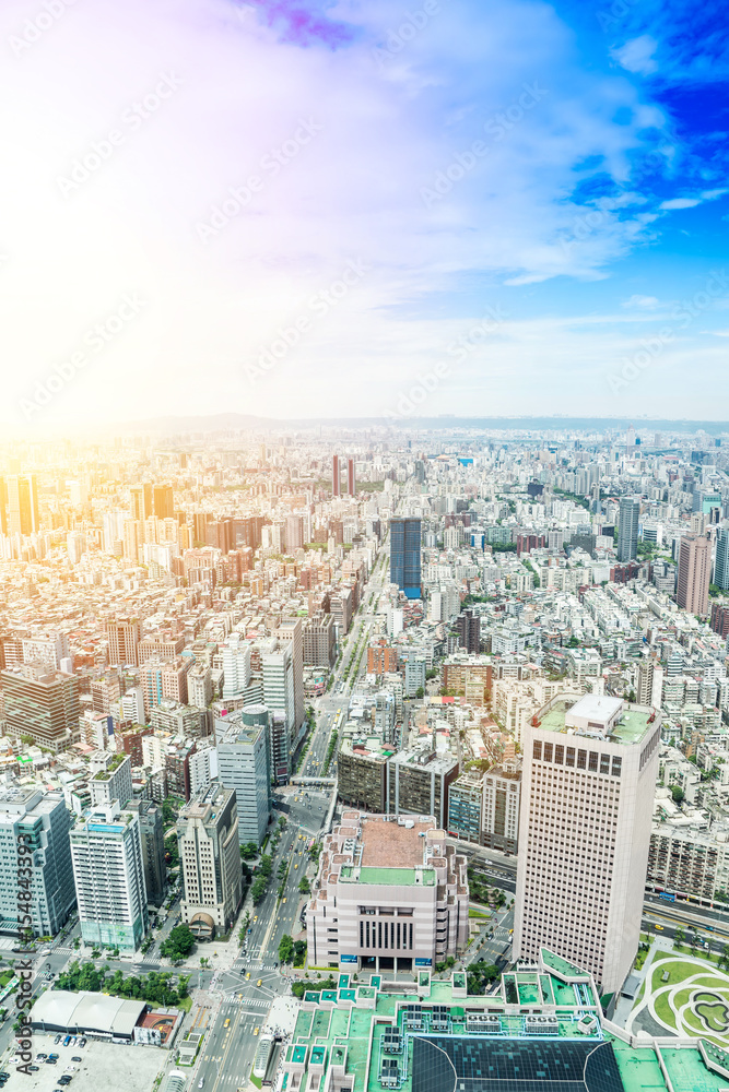Fototapeta premium Asia Business concept for real estate and corporate construction - panoramic modern cityscape building bird eye aerial view under sunrise and morning blue bright sky, shot in Taipei 101, Taiwan