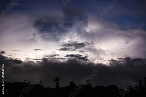 Thundercloud illuminated by lightning