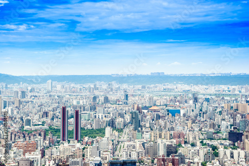Asia Business concept for real estate and corporate construction - panoramic modern cityscape building bird eye aerial view under sunrise and morning blue bright sky, shot in Taipei 101, Taiwan