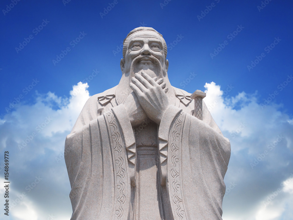Confucius statue with sky background