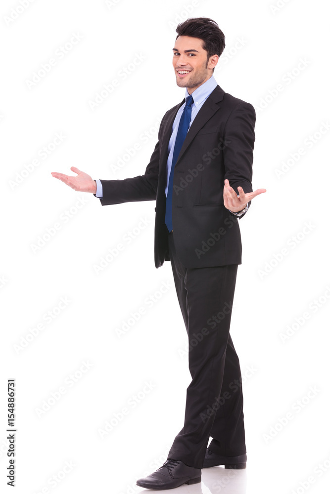 full body picture of an excited businessman welcoming full body picture of an excited businessman welcoming