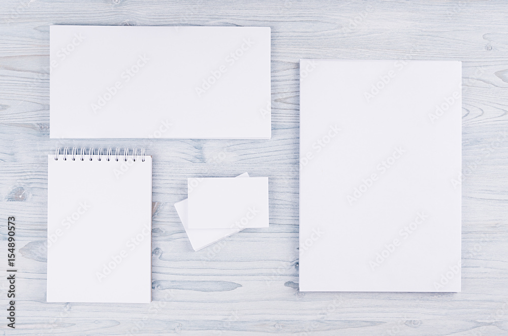 Corporate identity template, stationery on soft light blue wooden board. Mock up for branding, graphic designers presentations and portfolios. Corporate identity template, stationery on soft light blue wooden board. Mock up for branding, graphic designers presentations and portfolios.