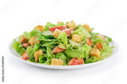Caesar salad on white background.