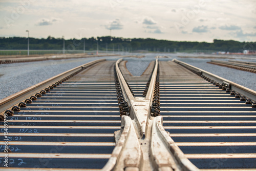 Canvas Print railroad crossover detail with sky